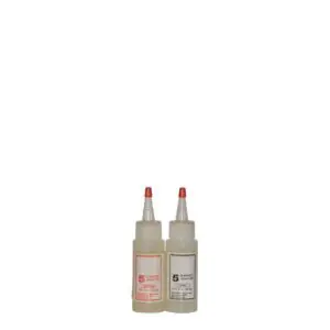 Two bottles with red caps