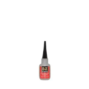 Instant adhesive with black cap