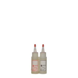 Two bottles with red caps