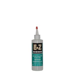 Glue bottle with red nozzle